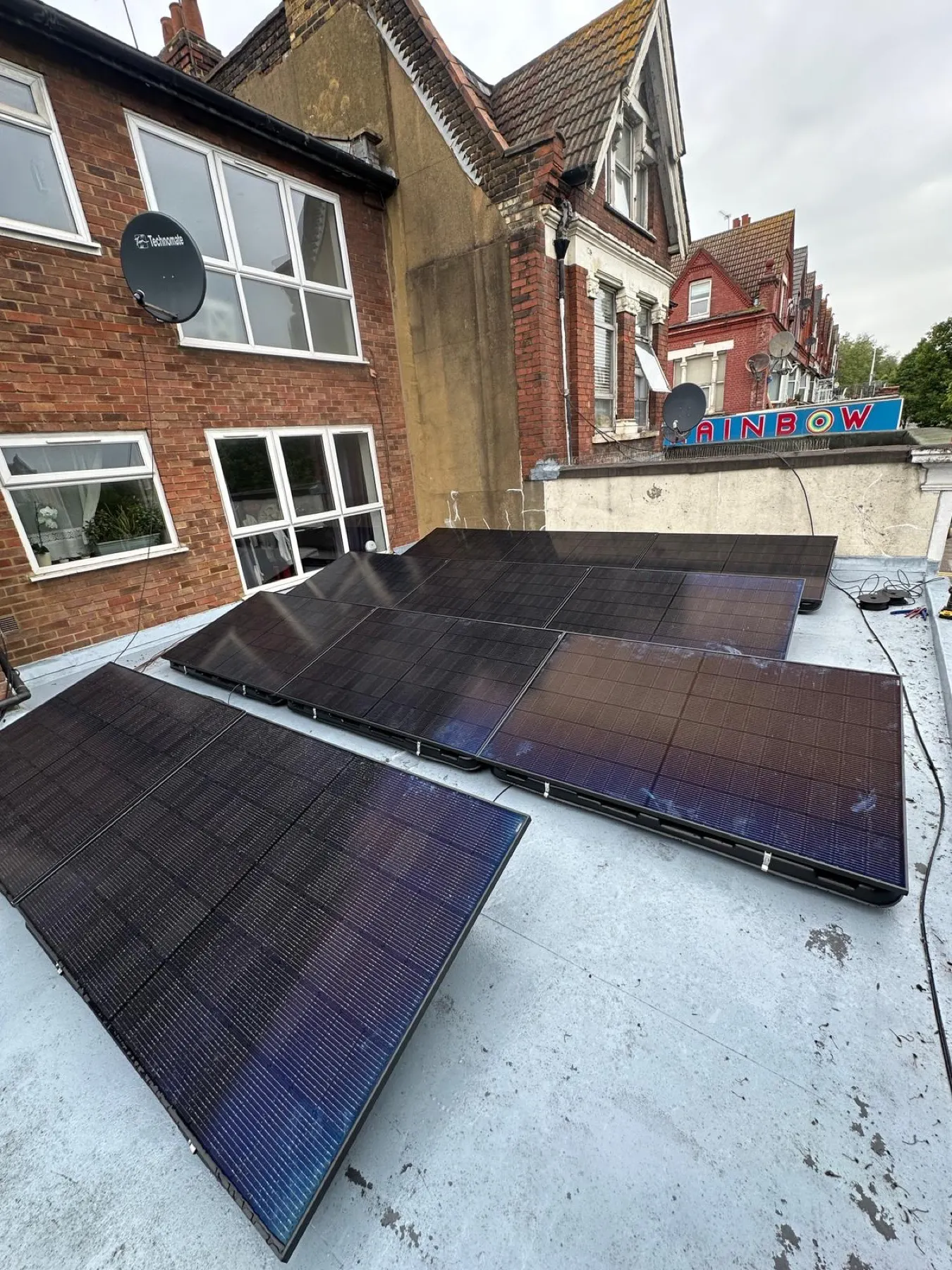 Solar panel installation on a flat roof in Hornsey, London
